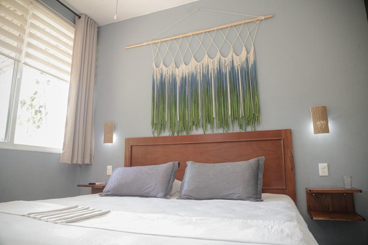 Hotel Makaaba Eco-Boutique Bacalar Bagian luar foto A wall hanging