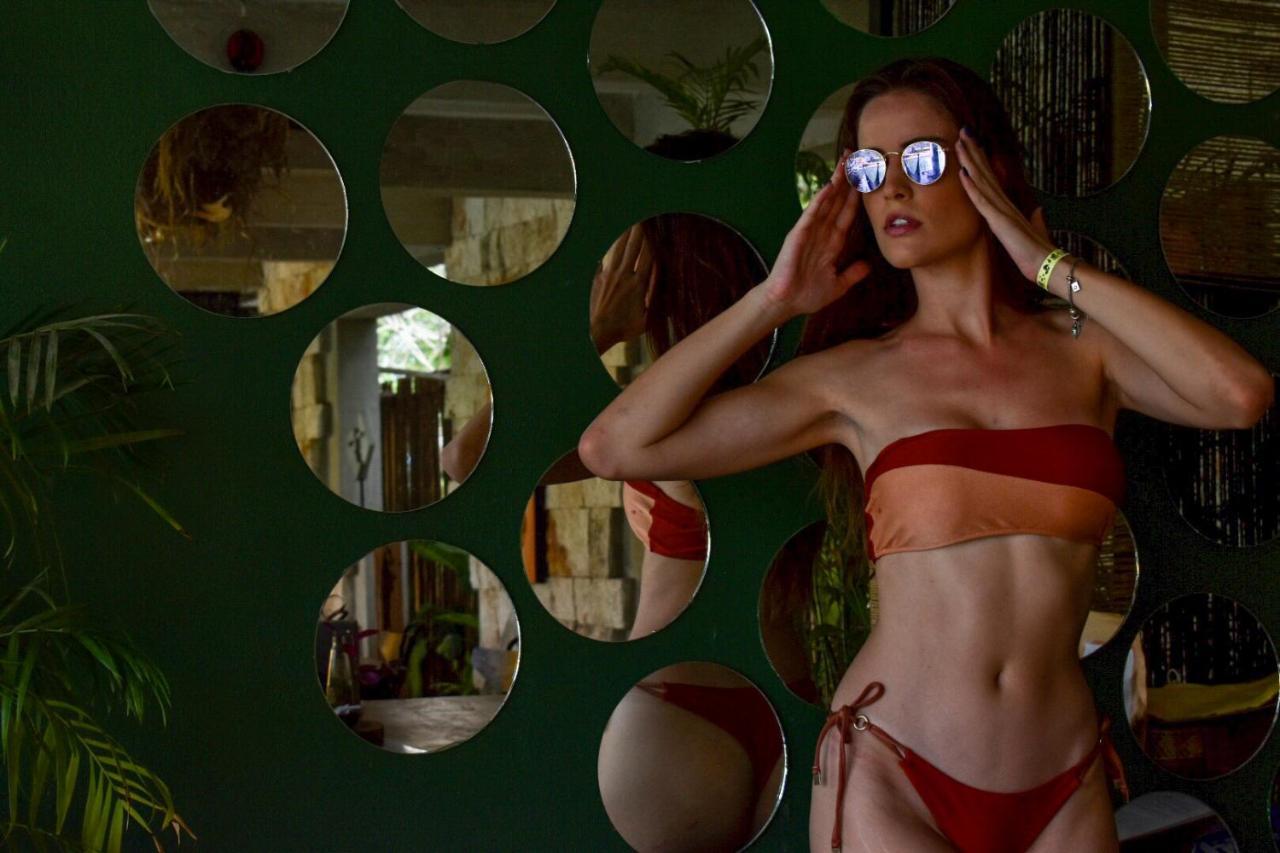 Hotel Makaaba Eco-Boutique Bacalar Bagian luar foto A model wearing a two-piece swimsuit